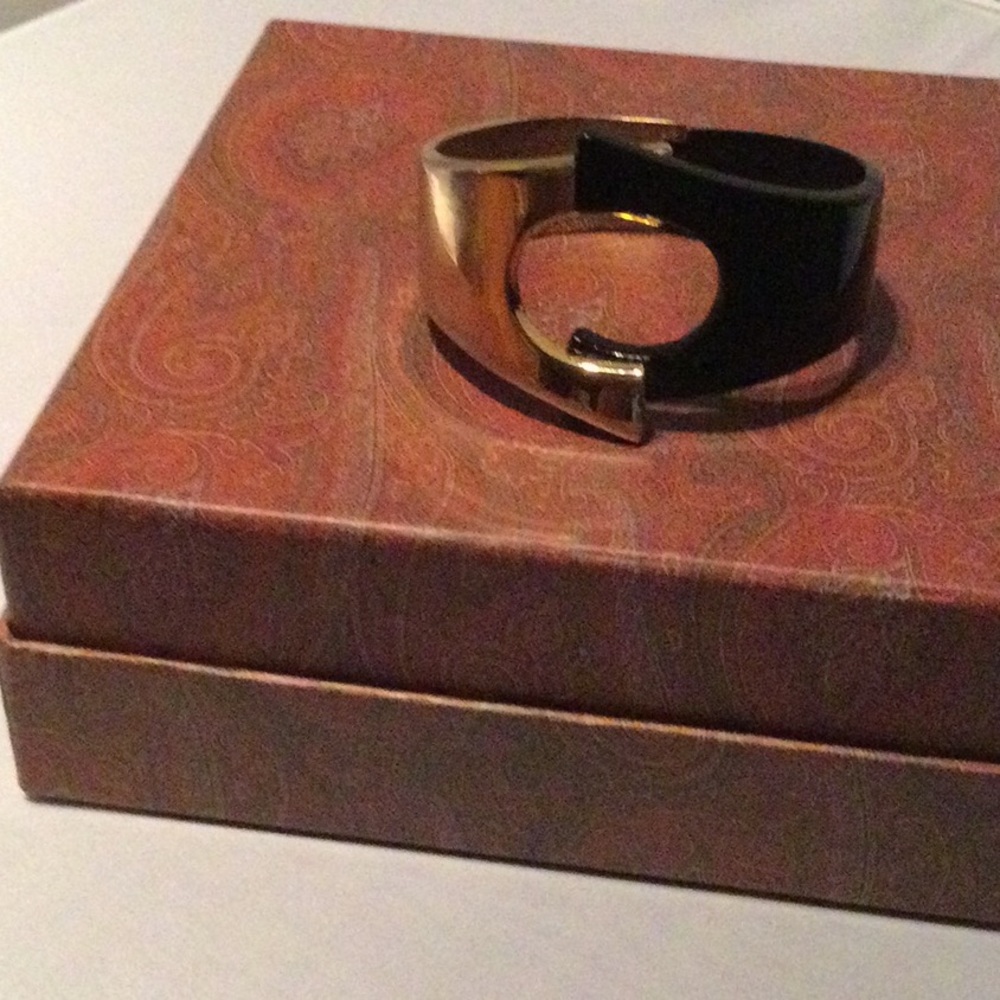Beautiful gold tone and black bracelet
